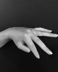 White ink tattoos would be a smart choice for finger. White Ink Heart Tattoo On The Left Ring Finger