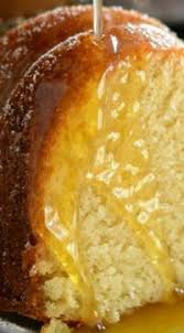 Almond Amaretto Pound Cake A Dense Moist Poundcake Flavored With Almond And Amaretto Liquor Topped With A War Desserts Almond Pound Cakes Pound Cake Recipes