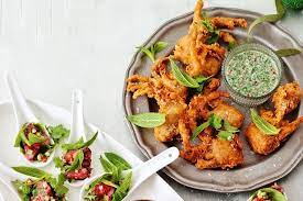 A specialfamily appetizer that features lallop leaves to be paired with toastedcoconut, peanuts,lallop leaves, thai fresh chili, ginger,dicedonion,lime and plum sauce arranged artfully on a wicker platter. Easy Thai Dinner Party Menu Menus Delicious Com Au