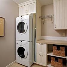 Stacked Washer And Dryer Laundry Layout Great For A Small Space I Like How There S A Cubby For T Laundry Room Remodel Laundry Room Design Laundry Room Shelves