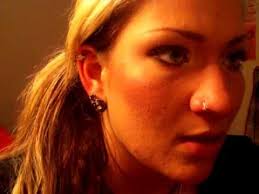 Put the tip of the stud through your piercing. How To Put In A Corkscrew Nose Stud Youtube