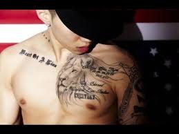 There are a lot of kpop artists with tattoos: Top 35 Kpop Idols With Tattoos Youtube