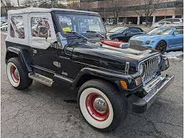 Image result for Brilliant Black 2002 Jeep
