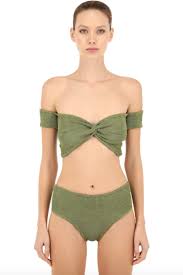 A swimsuit with a cascading ruffle down the middle and draping at the sides has a similar effect, and looks incredibly feminine. 15 Best Postpartum Swimsuits Bikinis One Pieces For New Moms