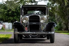 Image result for Fenway Gray 1931 Oldsmobile