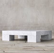 This elegant table in its simplicity has a marble piece on top and wheels. Marble Parsons Coffee Table Coffee Table Restoration Hardware Coffee Table Square Marble Coffee Table