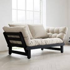 Since A Futon Is Essentially A Bendable Mattress This Could Make Your Space Look Cheap Since Futons Are Typically Futon Living Room Futon Sofa Stylish Futon
