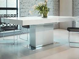 How big is a glass top dining room table? Modloft Astor Glossy White 71 94 Wide Rectangular Dining Table With Extension Molmd520laq