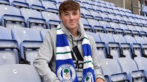 These memes with the men dancing with the coffin and that music beat drops are class 😂. Wigan Athletic Fc Alfie Devine Commits Long Term Future To Wigan Athletic