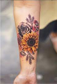 40 Beautiful Flowers Tattoos Ideas For Women Beautiful Flower Tattoos Tattoos For Women Flowers Sunflower Tattoo