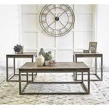 One coffee table and two end tables. Acadia 3 Piece Occasional Table Set
