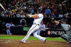 4 13 12 Dan Uggla Of The Atlanta Braves Knocks In The Game Winning Runs With This 8th Inning Single Against The Milwaukee Brewer Atlanta Braves Braves Atlanta