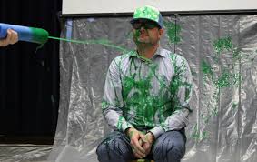 Principal slimed to celebrate student attendance