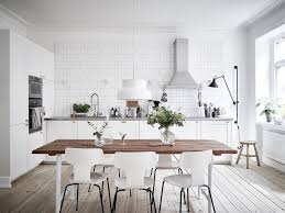Use an all white scheme to make accessories pop. 15 Designs Of A Modern White Kitchen With Elegance Looking Mesmerizing