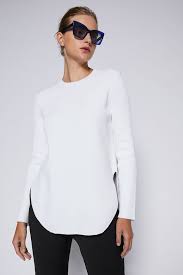 The inner fleece lining is slightly bigger to accommodate this stretch. Crepe Knit Shirt Tail Sweater Scanlan Theodore