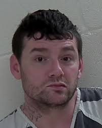 Police nab suspected domestic abuser fleeing in car while drunk