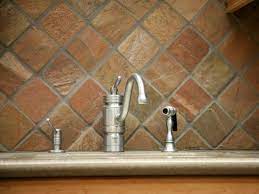 Uba tuba granite countertop with a natural slate tile backsplash cut down into 1, 2 and 3 x 12 pieces, and no grout joints. Slate Backsplashes Pictures Ideas Tips From Hgtv Hgtv