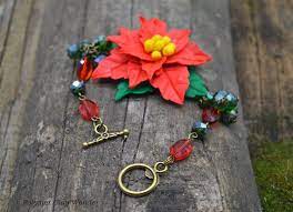 Christmas Red Poinsettia Bracelet With Crystal Beads Red And Etsy Poinsettia Bracelet Polymer Clay Bracelet Polymer Clay Necklace