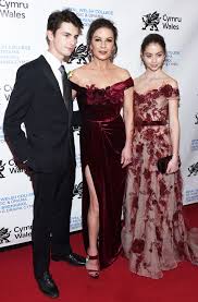 She is the recipient of several accolades, including an academy award, bafta award, tony award. Catherine Zeta Jones Cuddles Up With Daughter Carys Son Dylan People Com
