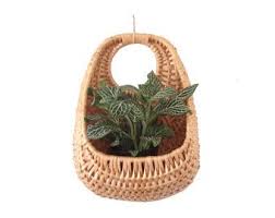 Natural rattan is great for hanging baskets and planters as the natural look blends well with plants. Unique Boho Woven Wicker Wall Basket Teardrop Hanging Basket Planter Plant Basket Wall Pocket Hand Woven Natu Baskets On Wall Wicker Wall Wicker Wall Basket