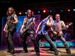 Warrant Performing At The Nutty Brown Amphitheatre In Austin