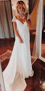 30 Beautiful Wedding Dresses By Top Usa Designers Wedding Dress Cap Sleeves Bohemian Beach Wedding Dress Most Beautiful Wedding Dresses