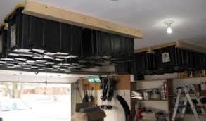 I'm always looking for great storage ideas and solutions, especially in the garage where things tend to pile up. Clever Overhead Storage Hack Bolts Containers To Your Garage S Ceiling Diy Storage Projects Diy Overhead Garage Storage Garage Ceiling Storage