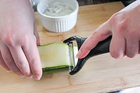 How to use vegetable peeler to cut zucchini ribbons. Zucchini Ribbon Salad With Cherry Tomatoes Easy Vegetarian Salad