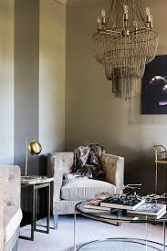 Cream gold brown living room ideas leather furniture. Alyssa Rosenheck Brown And Gold Living Room With Arteriors Maxim Chandelier