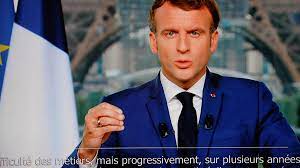 A macron is a line above a vowel to indicate that it should be spoken as a long vowel: Macron Makes Vaccines Compulsory For Care Workers Financial Times