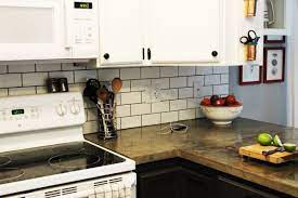 (this backsplash was done for $30 total!) its white. How To Install A Subway Tile Kitchen Backsplash