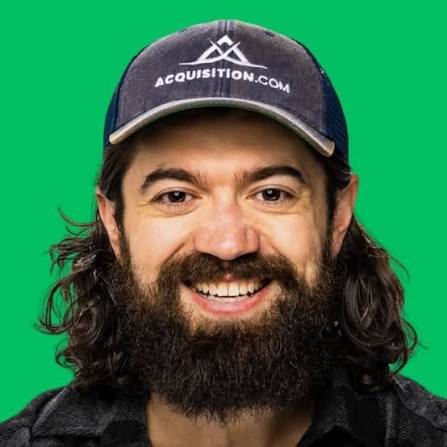 Alex Hormozi featured profile by TheAshNow highlighting his entrepreneurial journey, Acquisition.com, business strategy, books, and leadership.