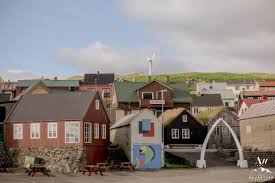 Traveler contest images the village of gásadalur with the island of mykines in the background. Adventure Weddings Eloping In The Faroe Islands