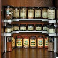 This wooden spice rack is both practical and decorative, and brings a warm, personal touch to an empty wall in your kitchen. Adjustable Spice Rack In 2021 Spice Storage Spice Organization Spice Rack