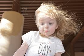 A woman who was tortured and enslaved by isis terrorists says they are mainly looking to isis are targeting women with blonde hair and blue eyes. Toddler Girl With Blue Eyes Blonde Curly Hair Blowing In The Wind On A Sunny Day Outside Stock Photo 572df98e F5a5 4239 92f3 6f718d42572e