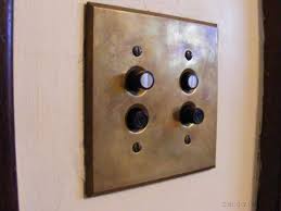 Our solid cast brass arts and crafts styled light switch covers & wall plates feature a unique windowpane design and authentic hammered surface. Stitch Light Switch Novocom Top