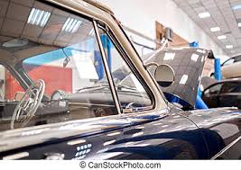 Classic and vintage road and race car restoration, preparation, and service shop how can we help you get your project ready? Classic Car Body Cleaning And Restoration By Professional Caucasian Restoration Technician Canstock