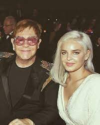 Pin By Wayne Martin On Anne Marie Elton John Sunglasses Elton John Fair Trade Fashion