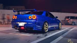 How to add custom wallpapers to ps4. Wallpaper Id 132827 Nissan Skyline Gt R R34 Jdm Japanese Cars Nissan Skyline Gt R Nissan Blue Cars Sports Car Night Car Vehicle Outdoors Taillights