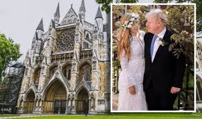 Britain's prime minister boris johnson and carrie johnson pose together in the garden of 10 downing street after their wedding on may 29, 2021. 0nukj0mqf4epdm