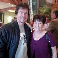 He is also known by his former stage name marky mark from his career with the group. Yup He Introduced Me To Mom Celebrities Male Celebrity Photos Mark Wahlberg