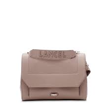 The company manufactured pipes before expanding into leather goods and handbags. Bag With Flap Lancel Official Store
