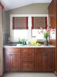 Paint sticks to the surface of wood, so it doesn't get lost in the mix of grains and knots the way a stain does. How To Stain Kitchen Cabinets Better Homes Gardens