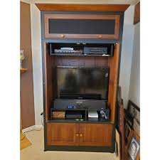 We bought it with money my parents gave us when we first bought our home and had our children. Ethan Allen American Impressions Mission Style Entertainment Center Chairish