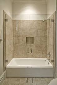 Glass paneled tub and shower. 59 Tile Tub Surround Ideas Tile Tub Surround Tub Surround Bathrooms Remodel