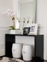 The main function of an entry table is for display purposes as they are oftentimes in mirrors are always really easy to work with because they make the room look larger and you don't have colors to coordinate with such as you would with a. 47 Console Table Decor Ideas Shelterness