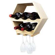 The wine racks, or holders, featured in this collection are all handmade, and most of them have been made using old or recycled materials such as old pallets, barrels, horse shoes, steel pipes and what not. Atterstone Honeycomb Wine Rack With Hanging Stemware Holder Wall Mounted Wine Bottle Display Rack Stylish And Unique Wooden Hexagonal Cell Holds 5 Bottles And 4 Glasses Amazon In Home Kitchen