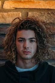 Trying To Maintain Beach Flow In Colorado Long Curly Hair Men Curly Hair Men Mens Hairstyles Thick Hair