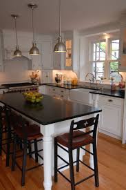 Bar stools can complement a kitchen island table, but they can be uncomfortable and can look out of place if they are too big or too small in proportion to the countertop. Small Kitchen Island With Dining Table Novocom Top