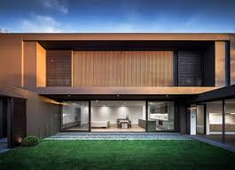 Whether you prefer the look of industrial metals, or would rather the warmth of wood, there are endless modern home styles to love, and the exteriors are no exception. House Colors Amazing Modern Facade In Brown Architecture Beast